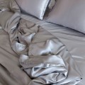 The fitted sheet has no stretch, but it still fits my bed well.